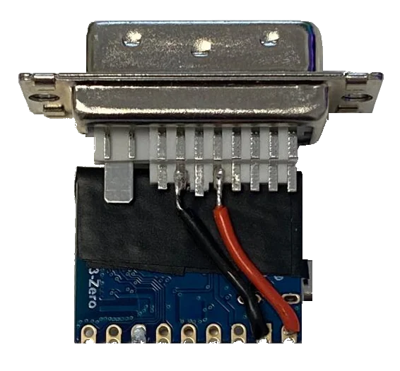 Bottom view of the DVI connector attached to the ESP32-S3 adapter board with short red and black soldered wires